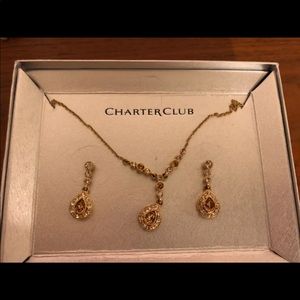 Gold and brown jewelry set.